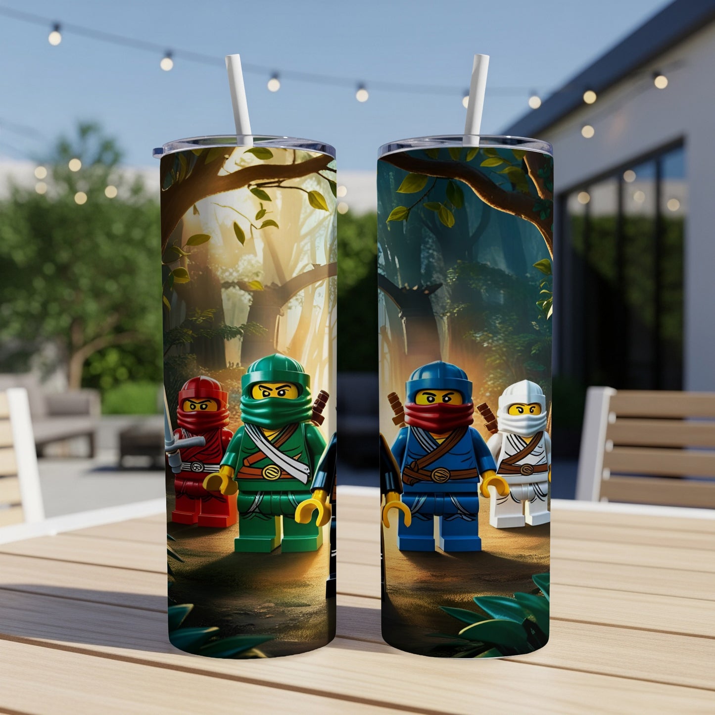 Two Ninjago LEGO character tumblers with straw on a table.