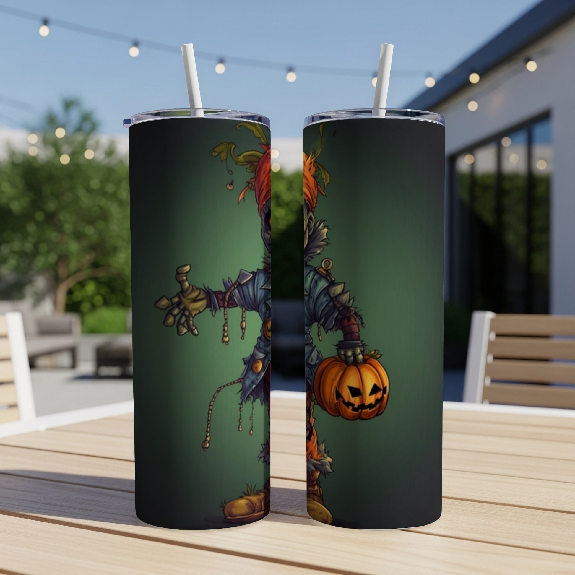 Two tumblers with a spooky scarecrow and jack-o'-lantern Halloween design.