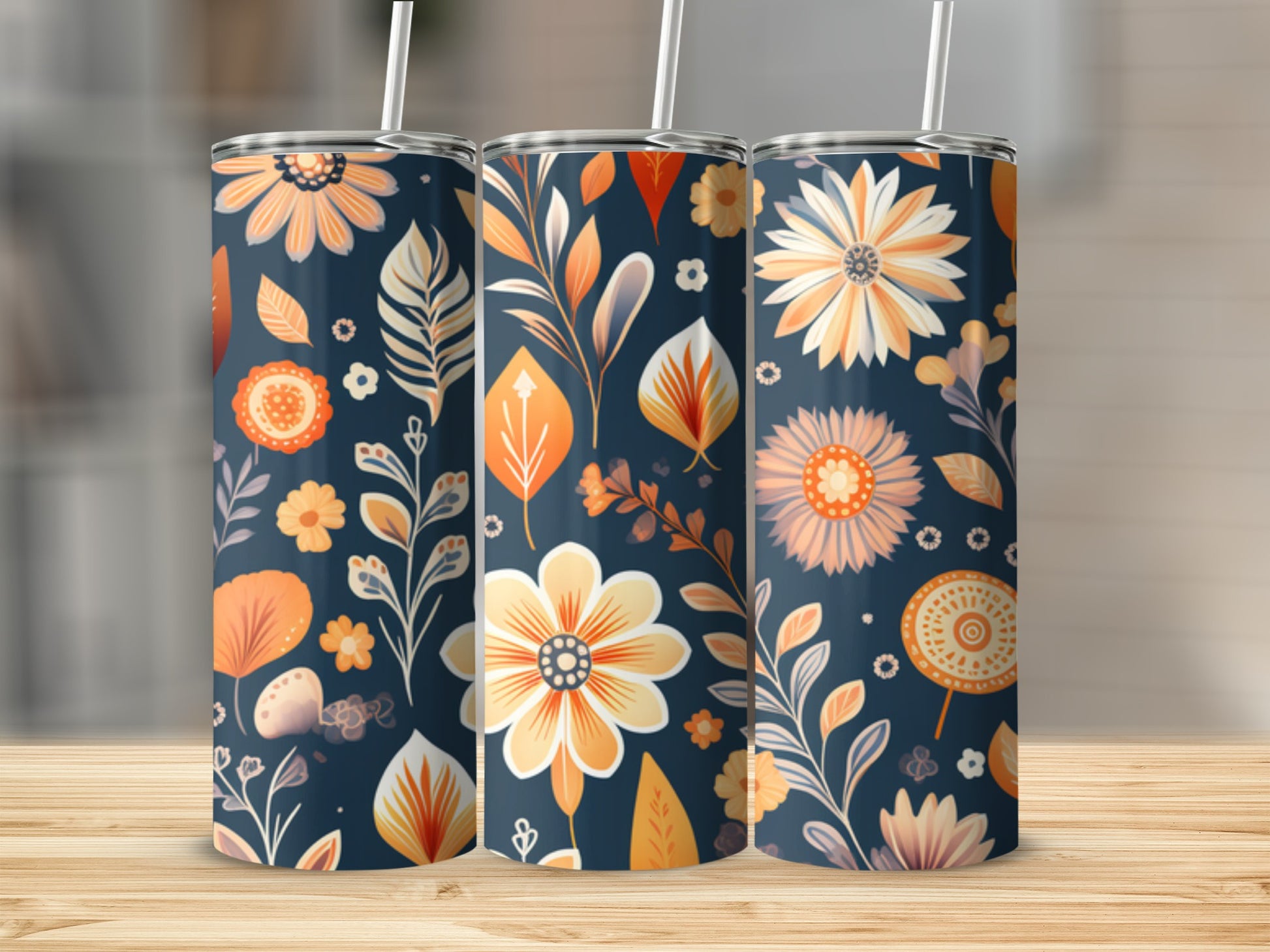 Three tumblers with a dark blue floral and leaf pattern.