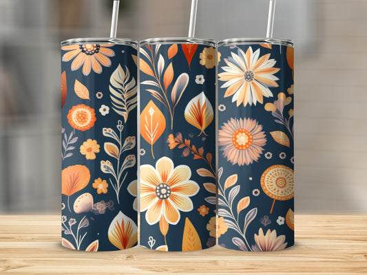 Three tumblers with a dark blue floral and leaf pattern.