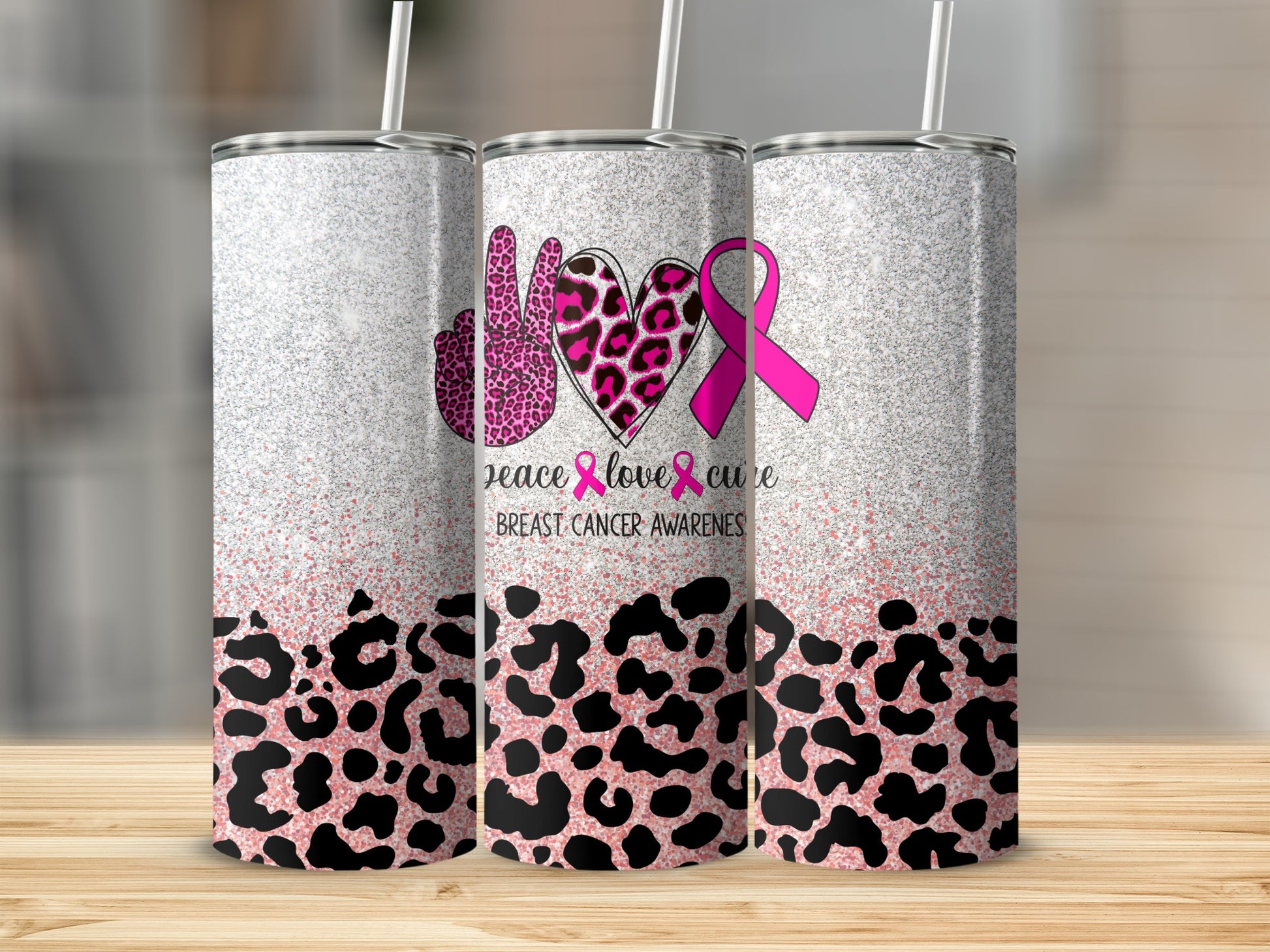 Pink leopard print tumbler with "peace love cure breast cancer awareness" and ribbon.