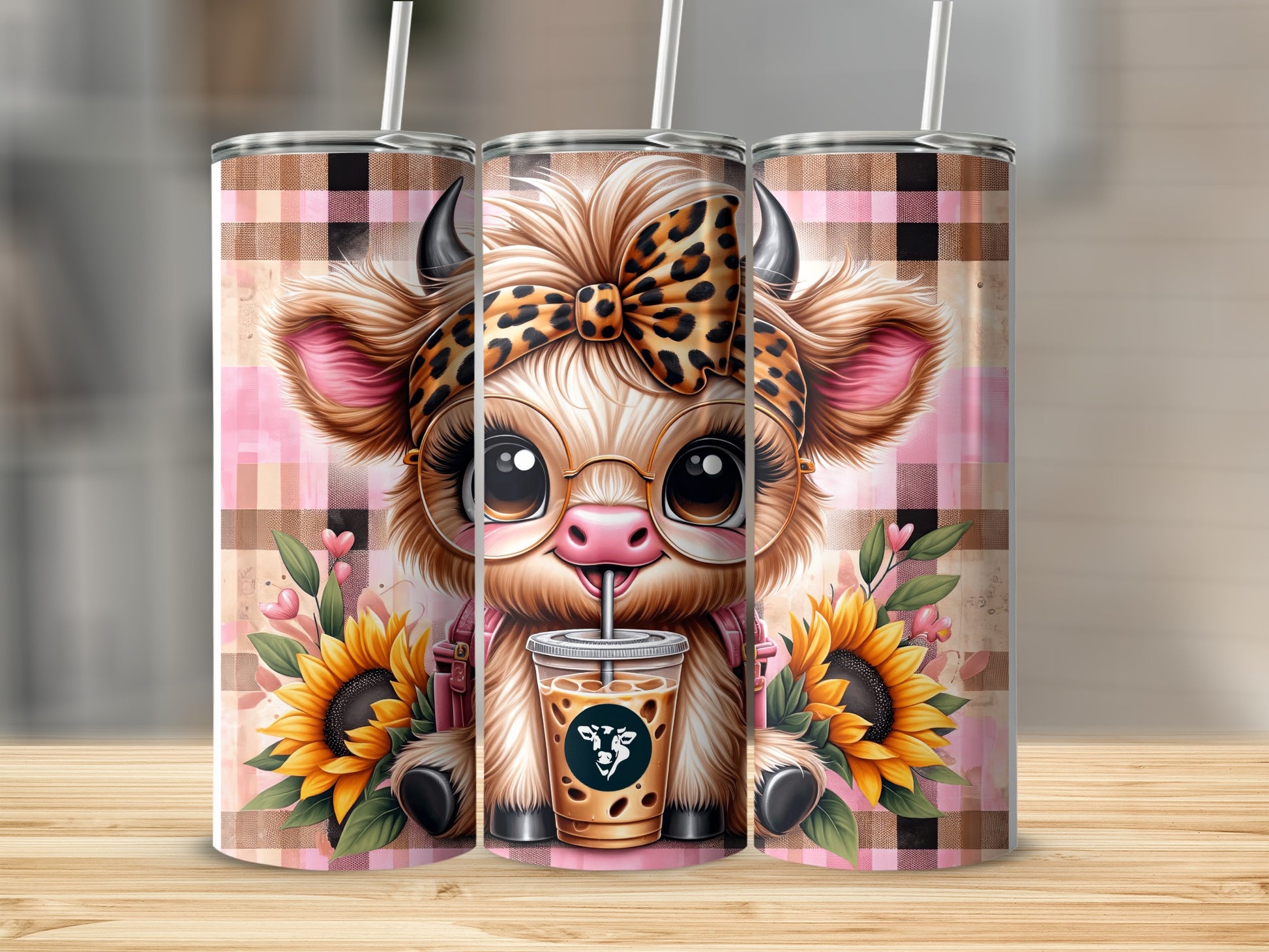 Cute cartoon cow with sunflowers and iced coffee wearing a bow.