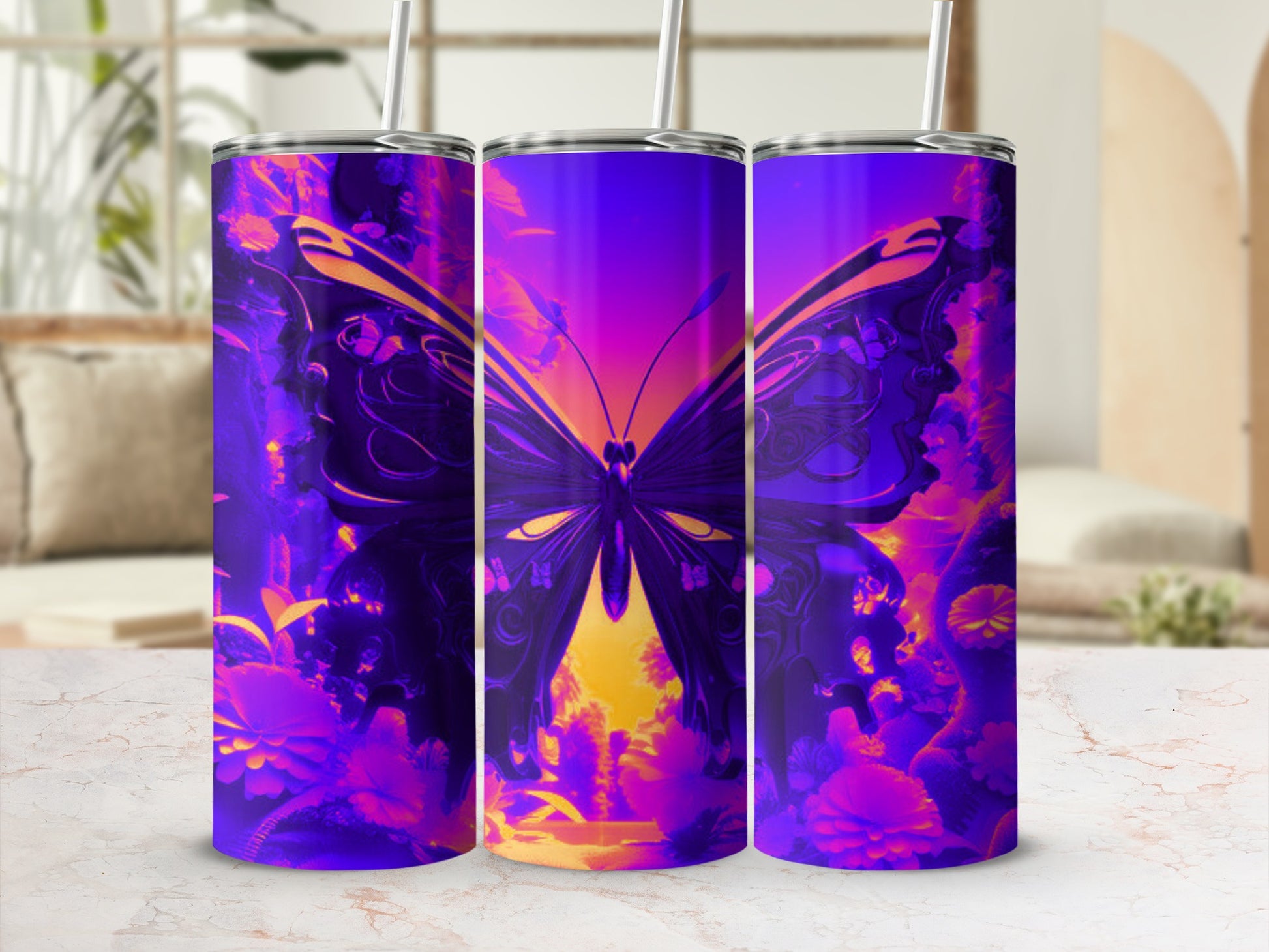 Purple and orange butterfly design on three tumblers with straws.