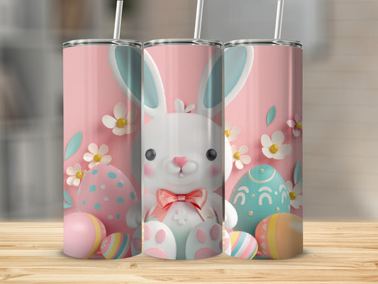 Easter bunny and eggs tumbler design on pink background.