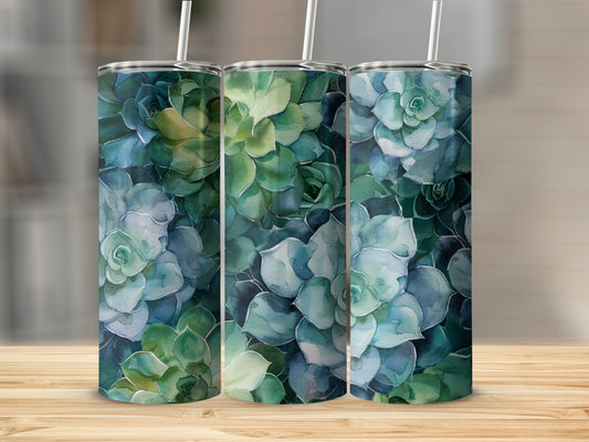 Three tumblers with a watercolor succulent pattern stand on a wooden surface.