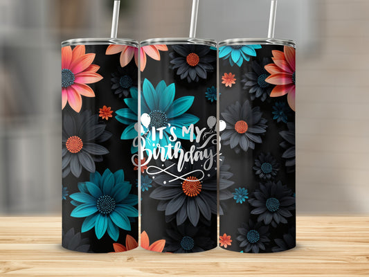 Tumbler with dark background and colorful floral pattern, "It's My Birthday!" text.
