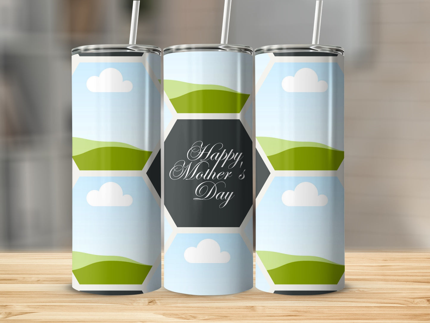 Three tumblers with a landscape design and "Happy Mother's Day" text.