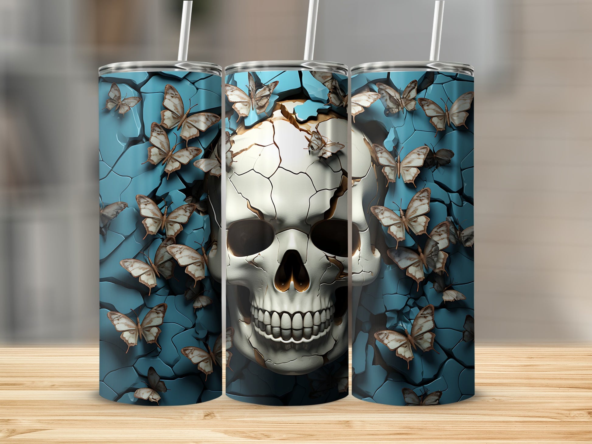 Cracked skull with butterflies, displayed on three tumblers.