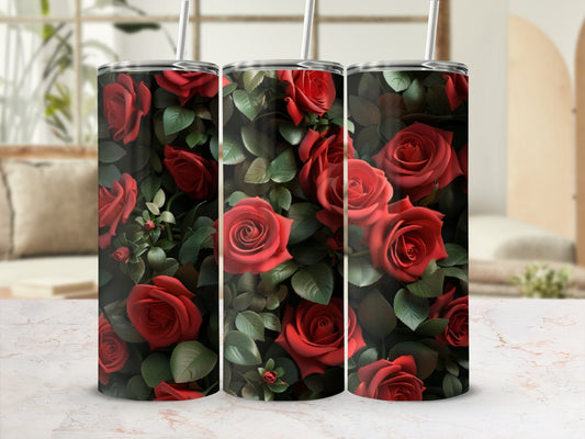 Three tumblers with a repeating pattern of red roses and green leaves.