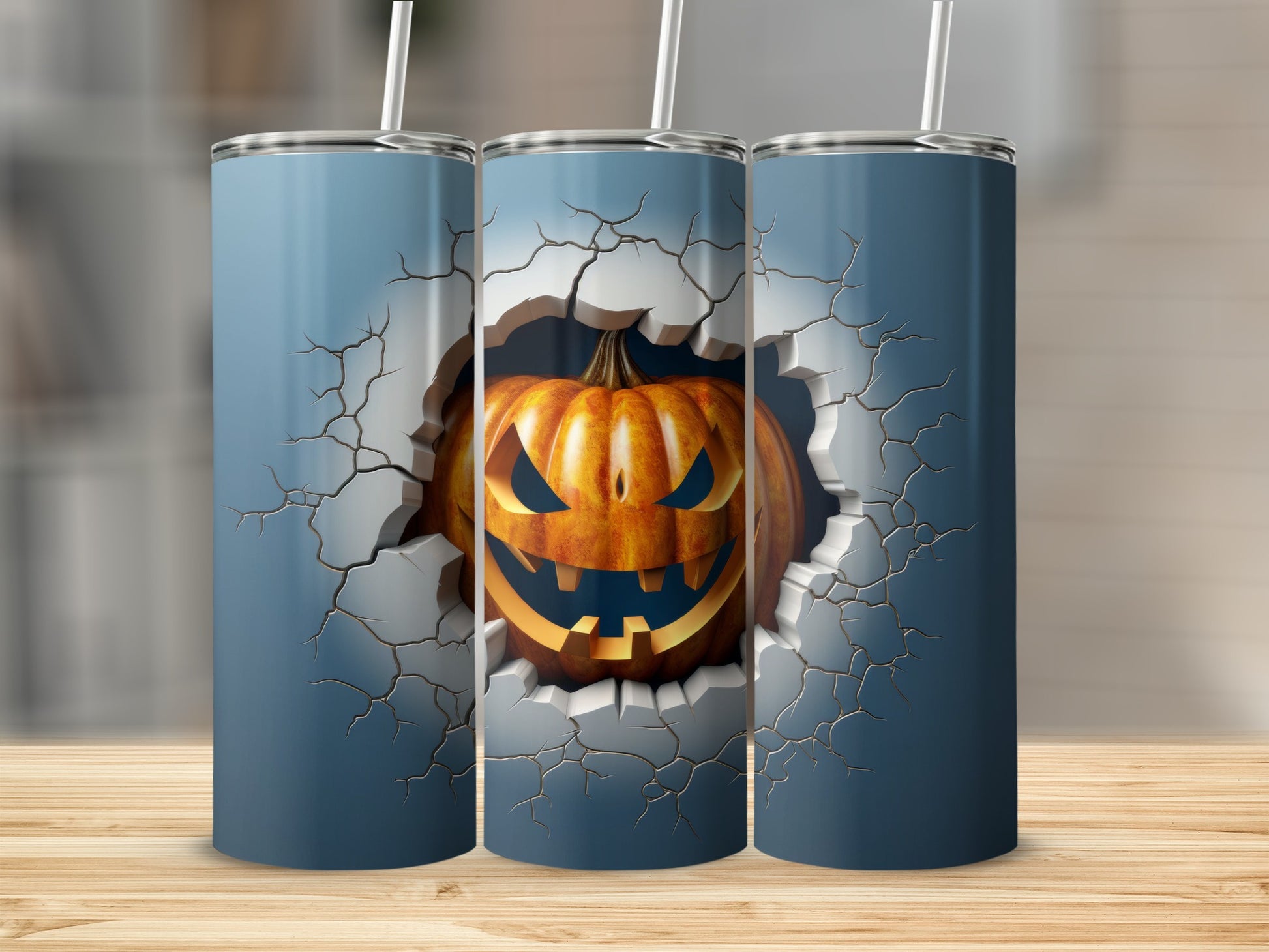 Three tumblers featuring a cracked wall design with a spooky jack-o'-lantern.
