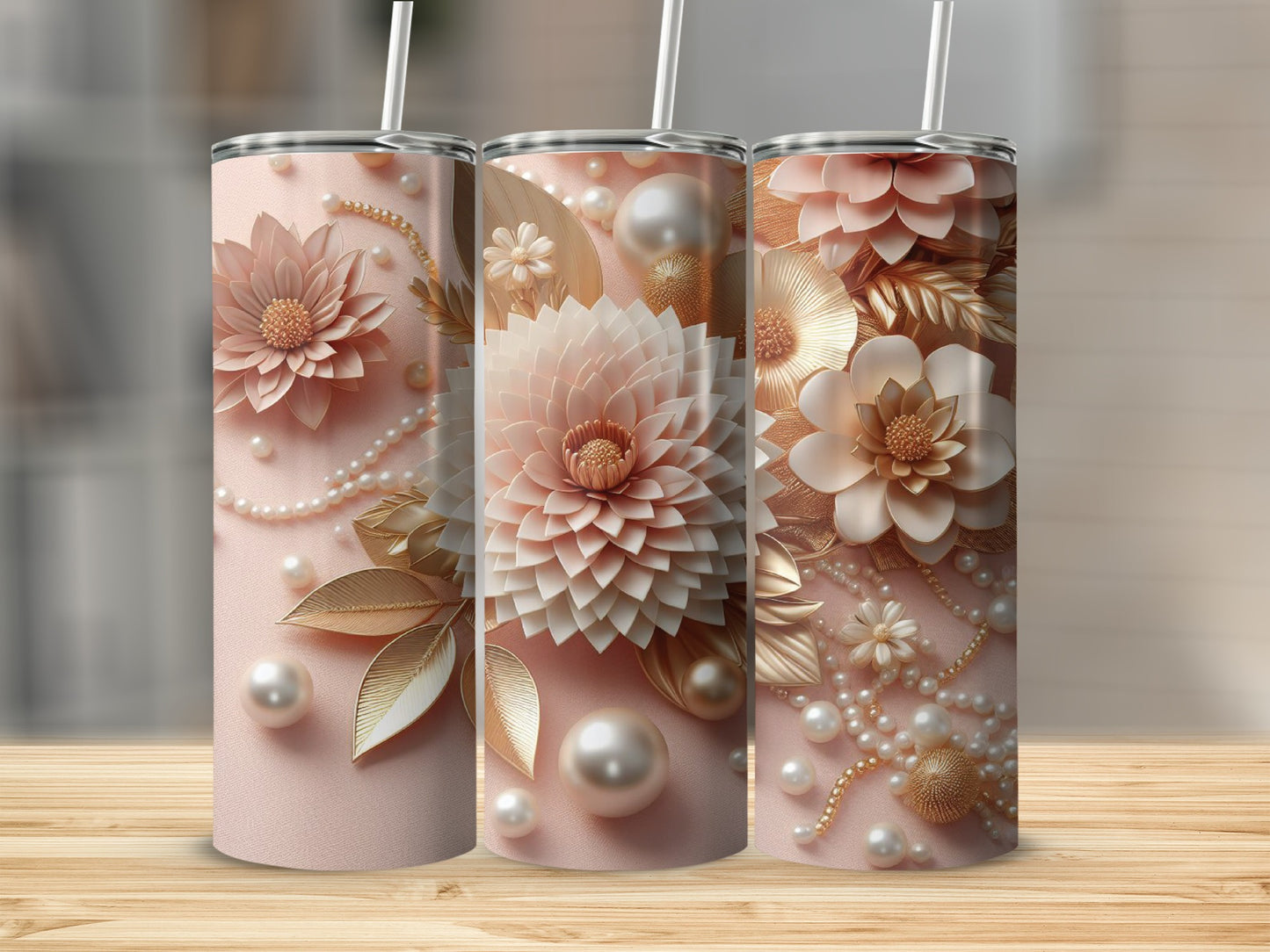 Three pink tumblers decorated with pearls and gold floral accents.