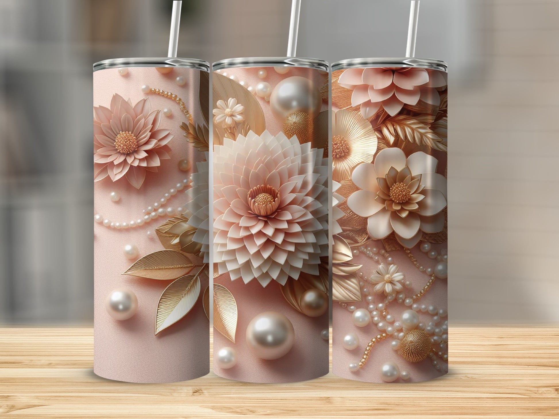 Three pink tumblers decorated with pearls and gold floral accents.