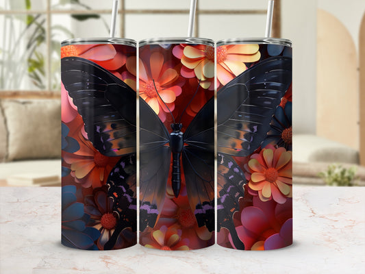 Black butterfly on a floral background with orange and pink flowers.