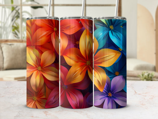 Three tumblers featuring colorful floral designs in red, orange, yellow, and blue hues.