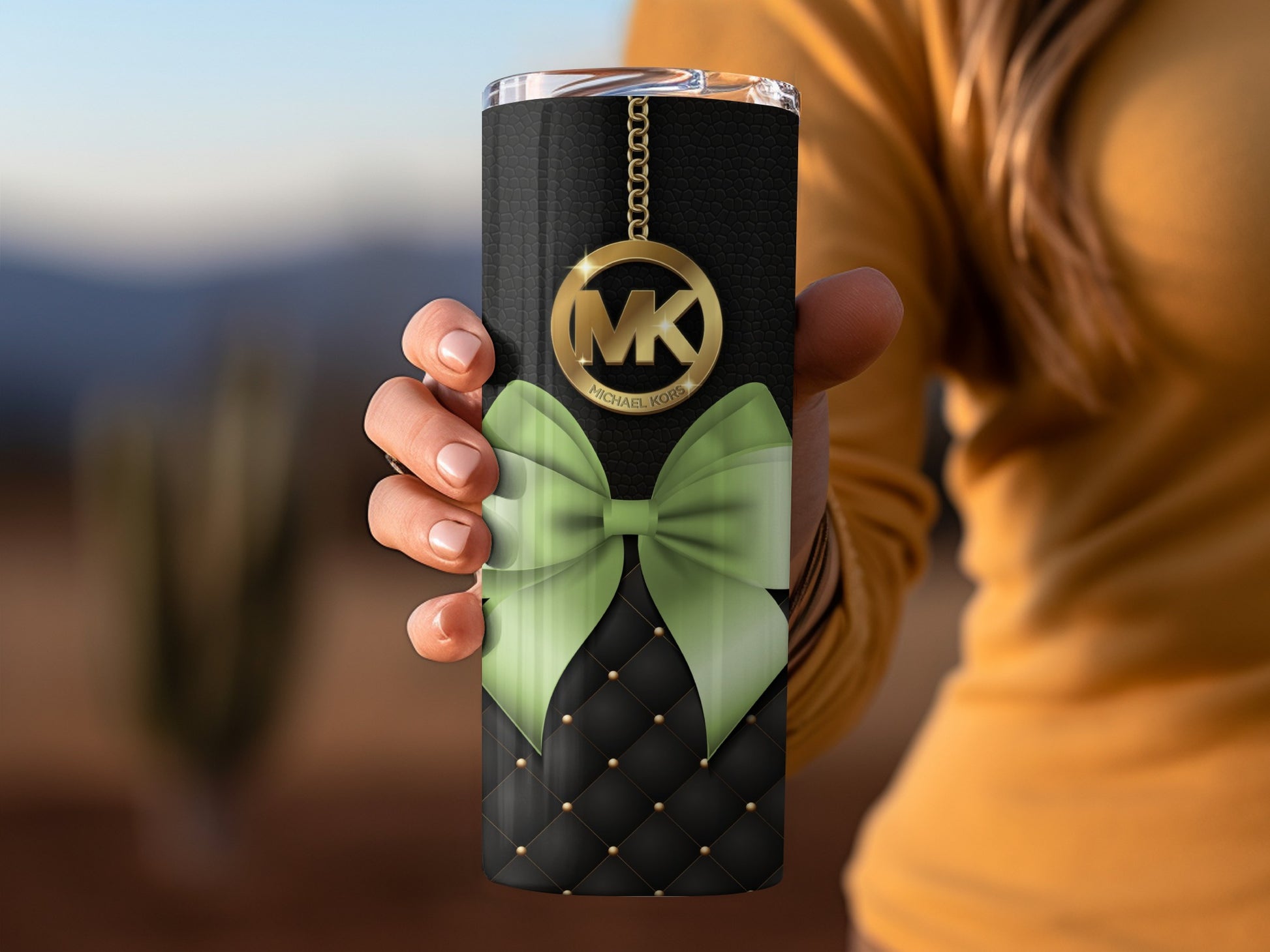 Luxurious Black Tumbler with Gold Accents and Green Bow