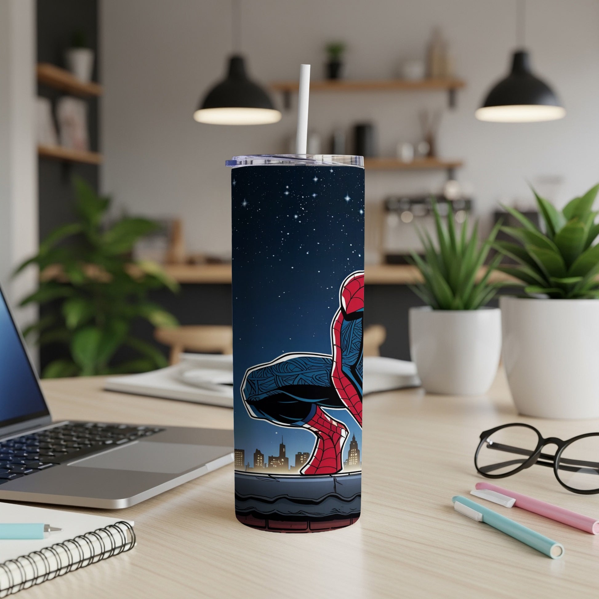 Spider-Man on a rooftop against a starry night sky on a skinny tumbler.