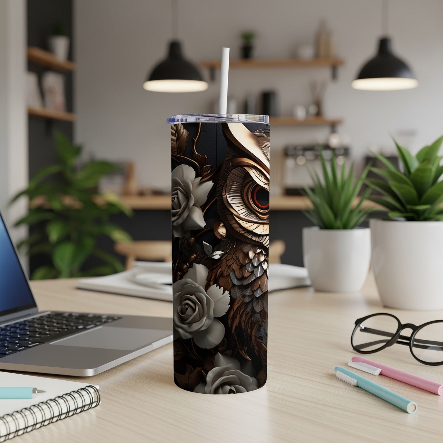 Gold owl and roses design on a white tumbler with a straw.