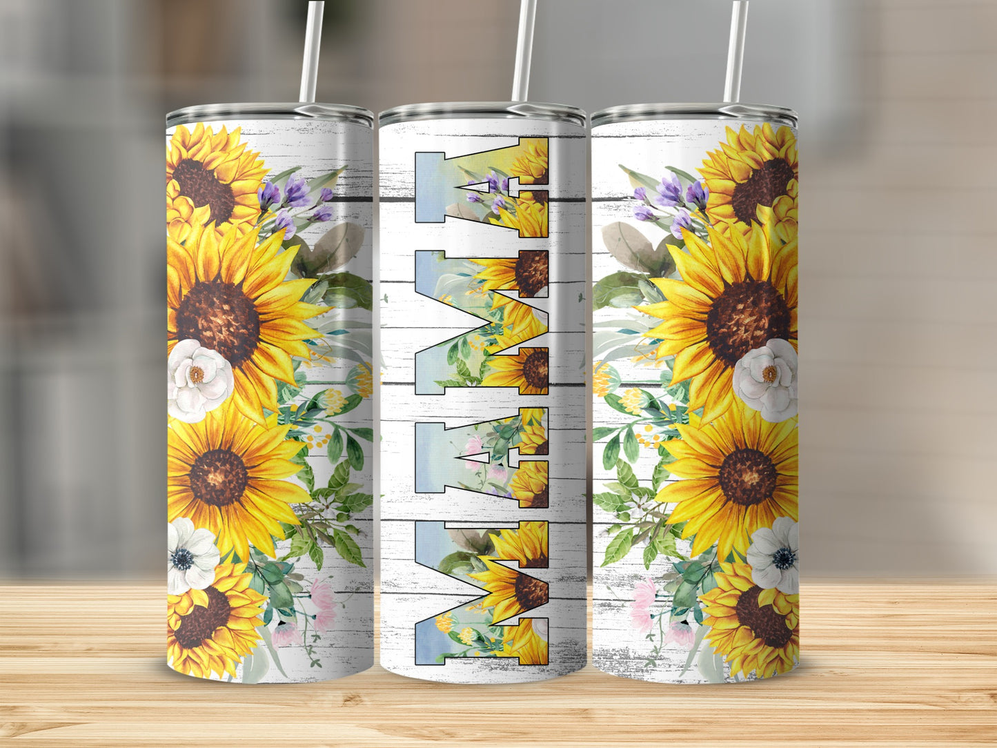 Three tumblers with sunflowers and "Mama" text against a wooden background.