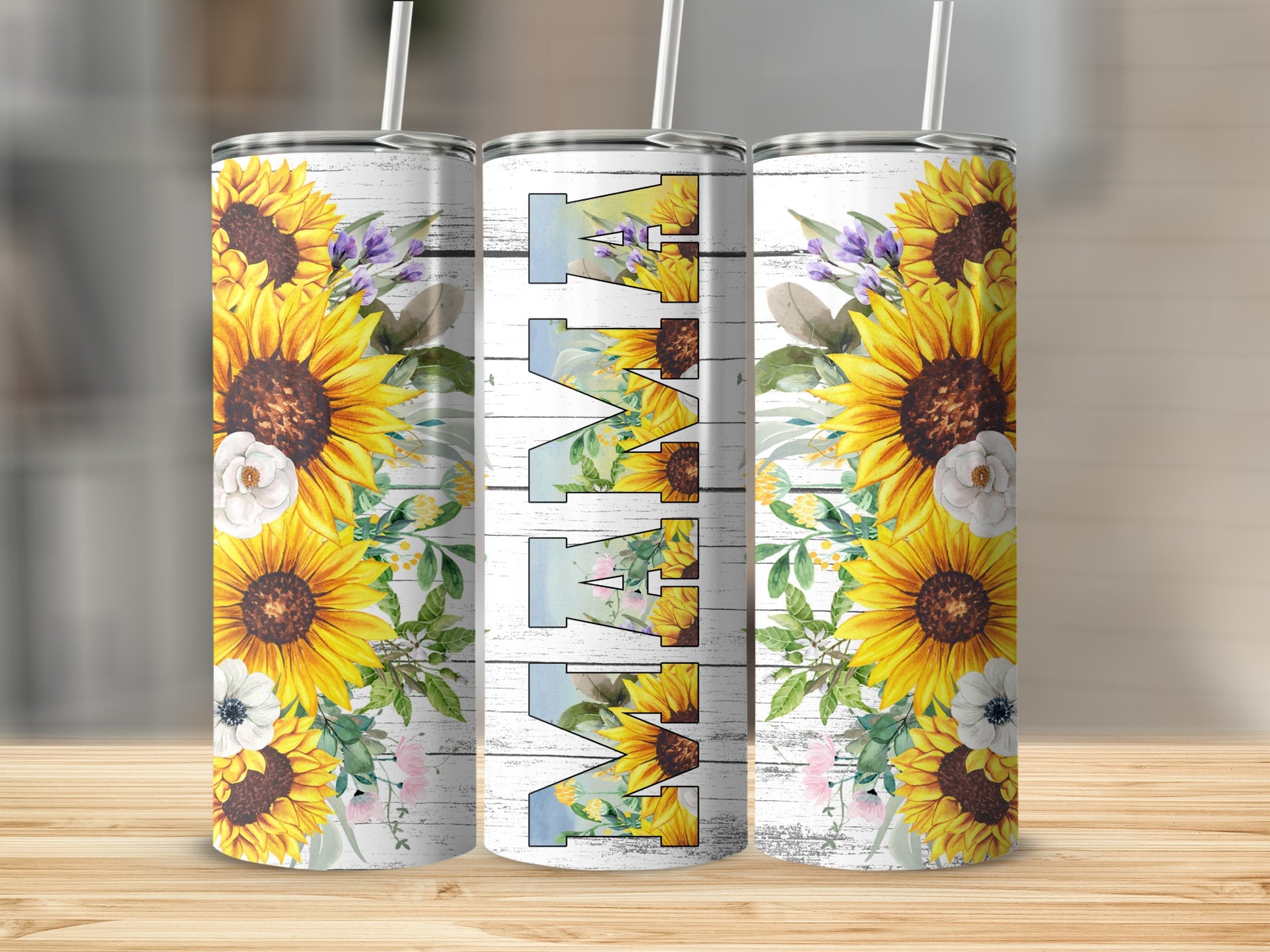 Three tumblers with sunflowers and "Mama" text against a wooden background.