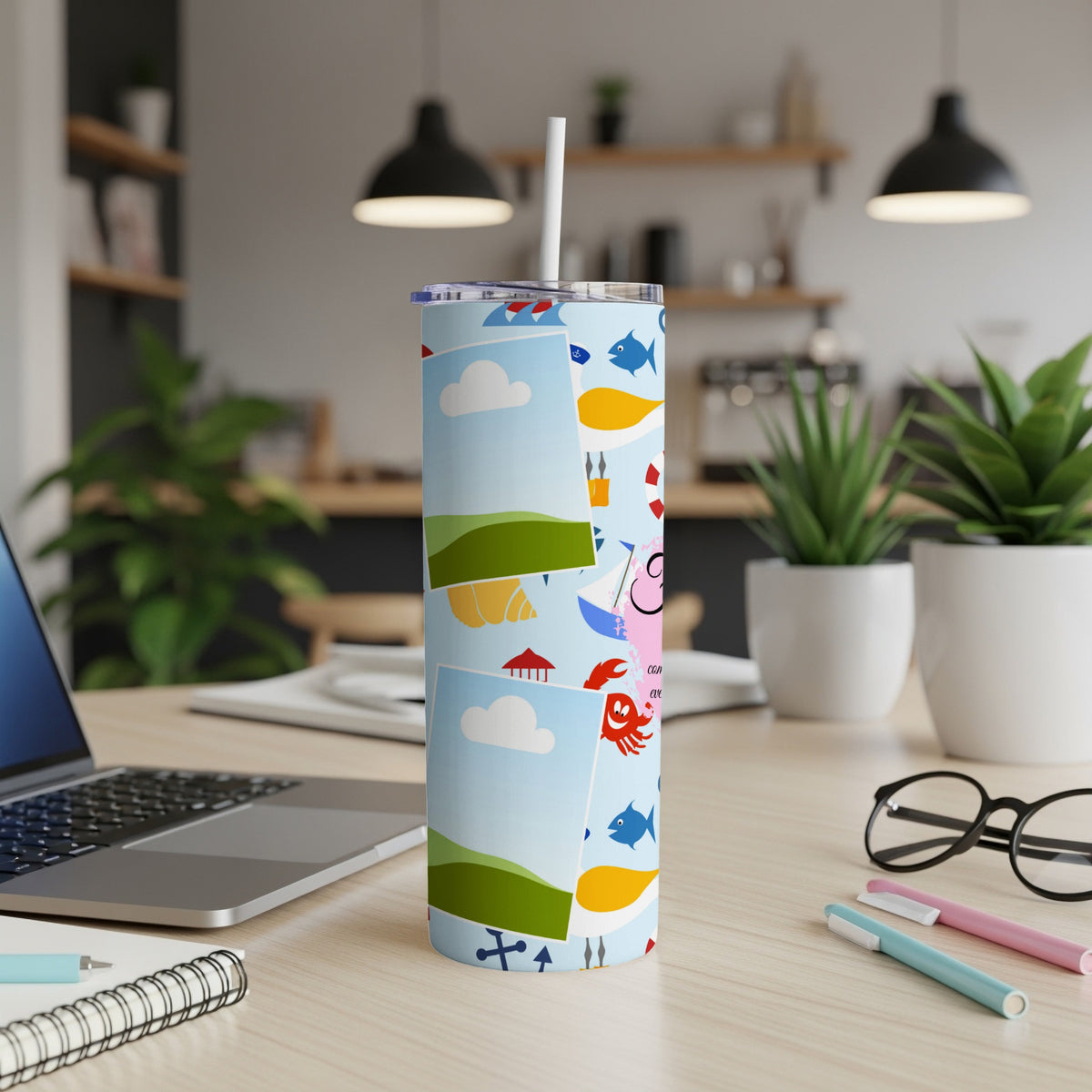 Tumbler with a light blue background and a repeating nautical design.