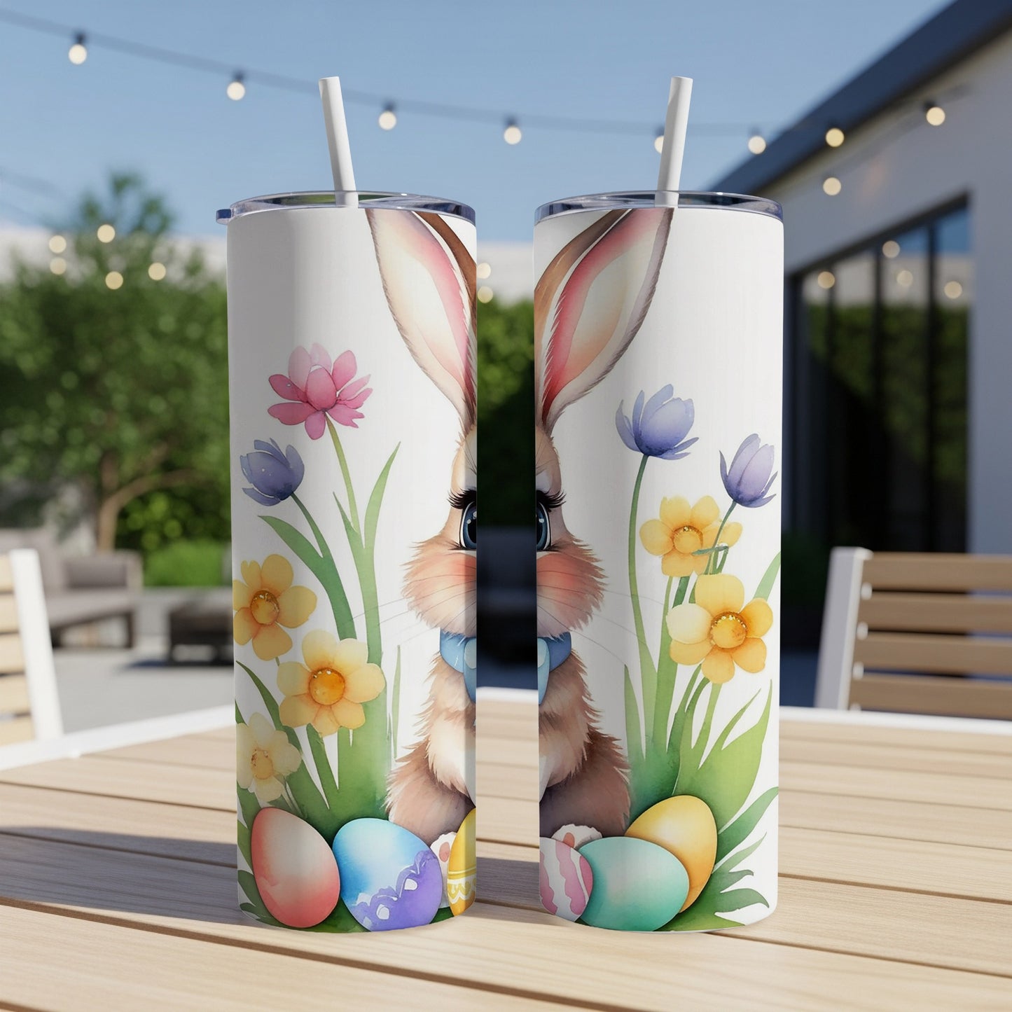 Easter bunny with colorful eggs and flowers on a tumbler.