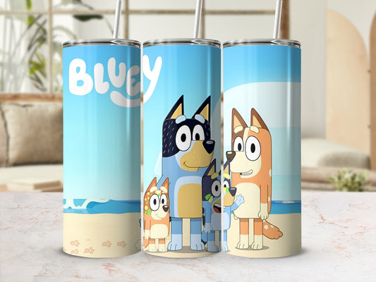 Bluey characters on a beach scene tumbler.