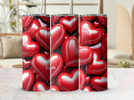 Red heart pattern tumbler with straws.