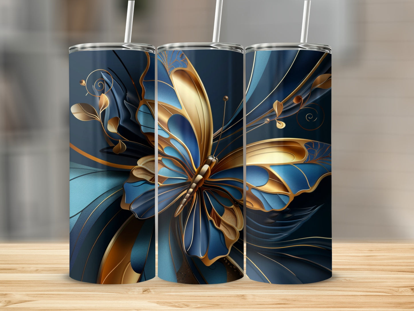 Three tumblers with a blue and gold butterfly design.