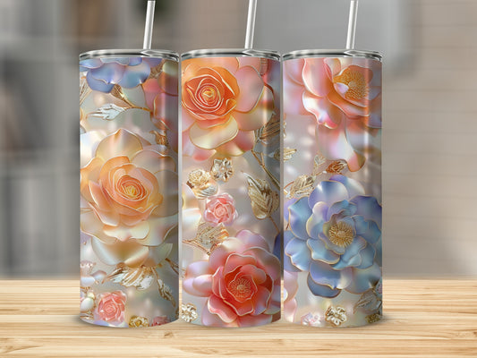 Three tumblers with rose floral patterns in pink, orange, and blue hues.