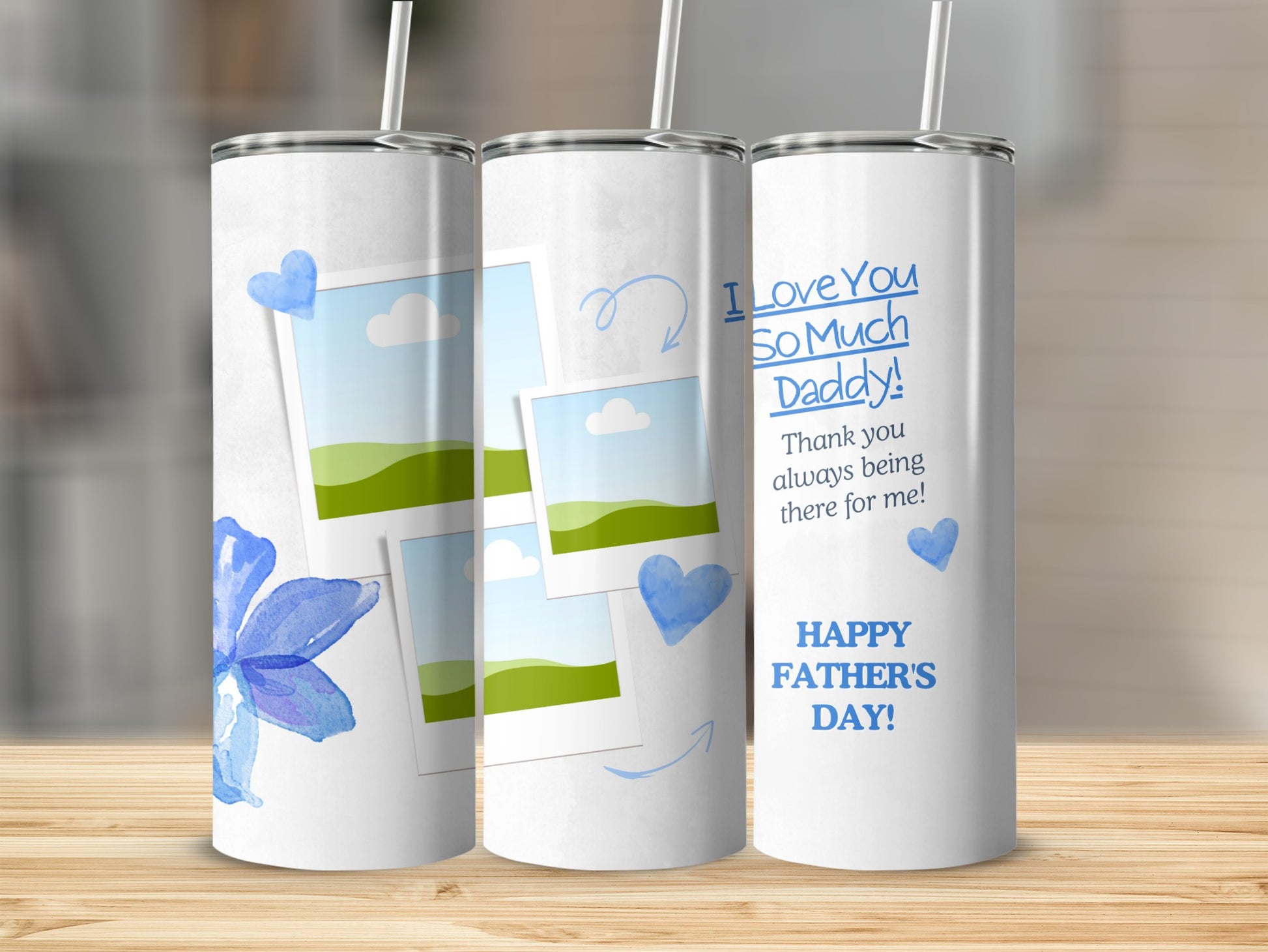 Tumblers with blue hearts, watercolor flowers, and text for Father's Day.