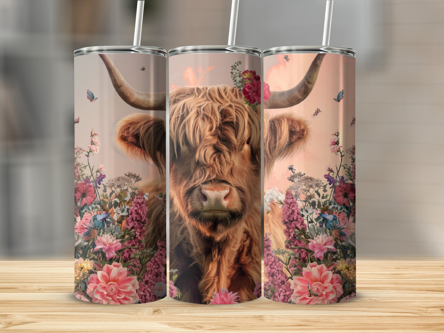 Highland cow with flowers and butterflies on a tumbler.