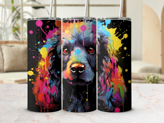 Black dog with vibrant paint splatters on a black tumbler.