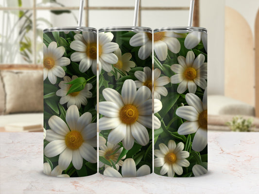 Three tumblers with white daisy floral print and green leaves.