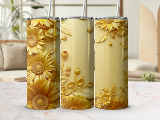 Gold floral pattern on three insulated tumblers with straws.