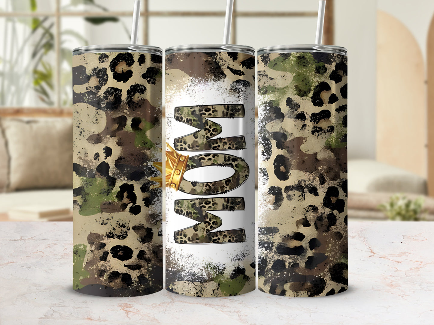 Camouflage and leopard print tumbler with "MOM" text and crown.