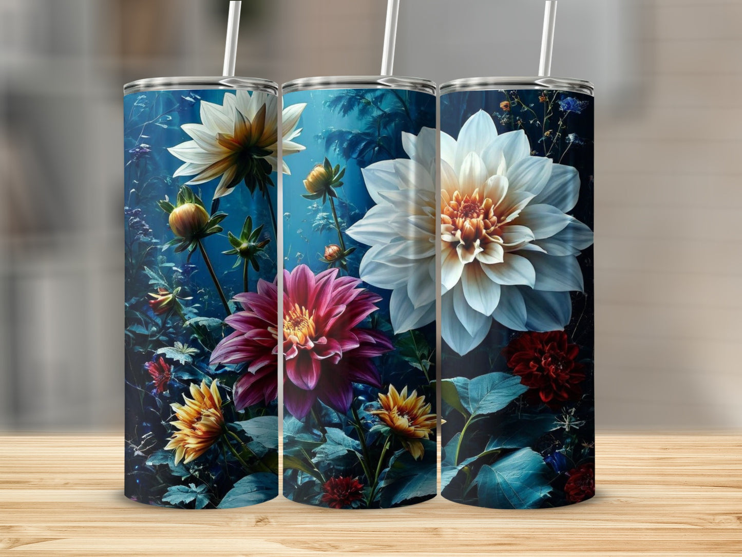 Three tumblers decorated with vibrant dahlias and foliage.
