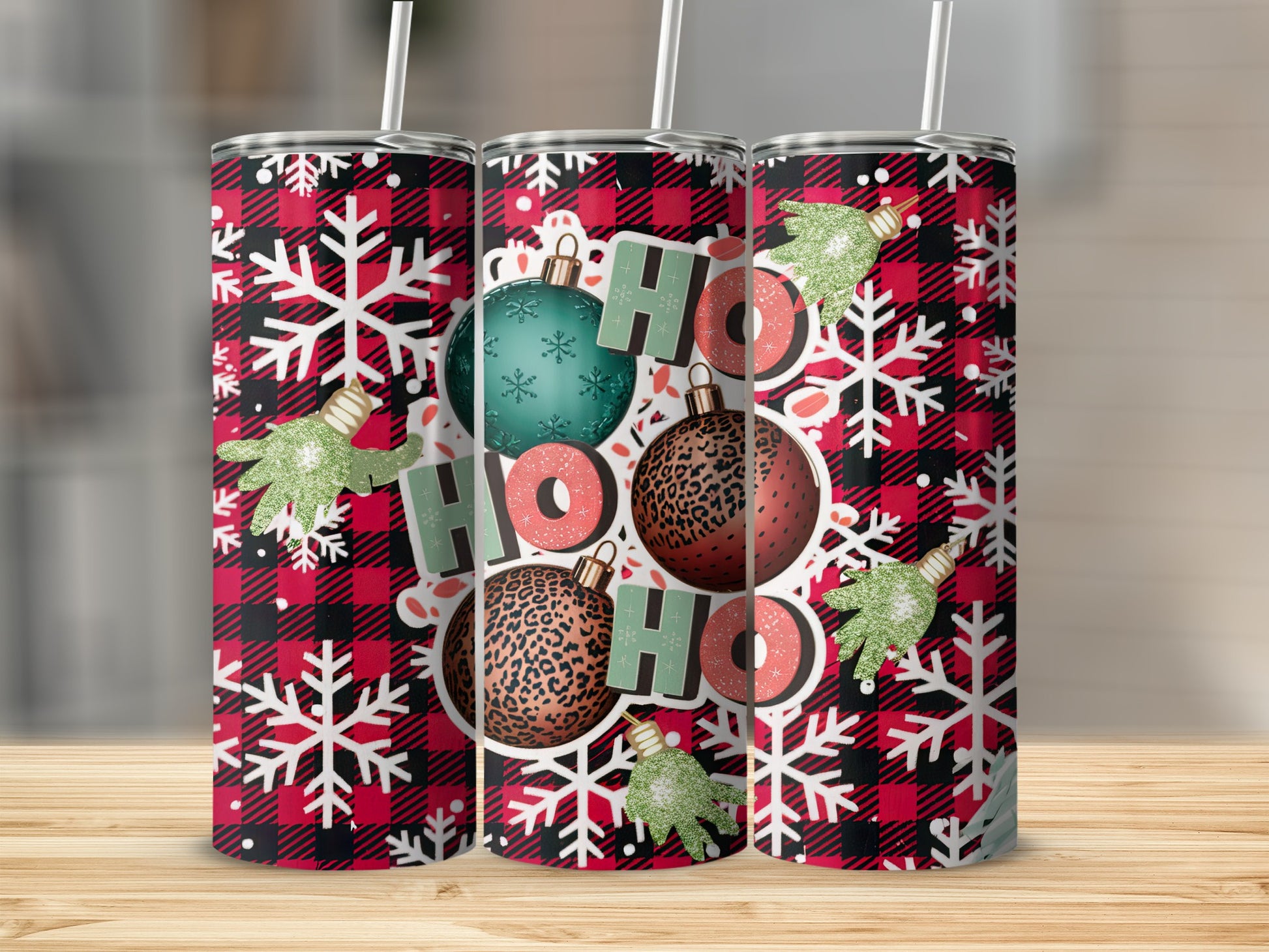 Red and black buffalo plaid tumbler with snowflakes and "Ho Ho Ho" ornaments.