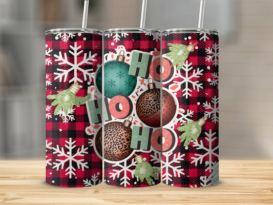 Red and black buffalo plaid tumbler with snowflakes and "Ho Ho Ho" ornaments.