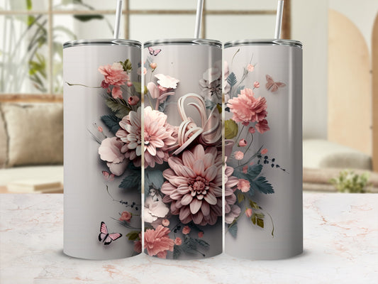 Three tumblers with a floral design and butterflies on a light background.