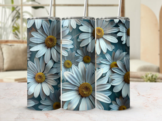 White and yellow daisies pattern on a tumbler with two straws.