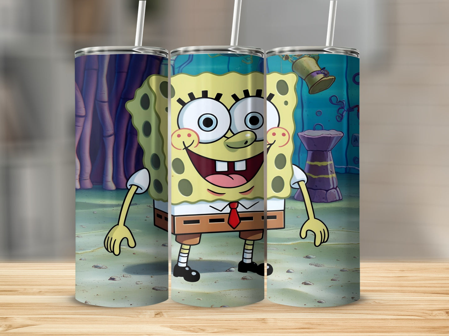 SpongeBob SquarePants character on three repeating tumblers with underwater background.