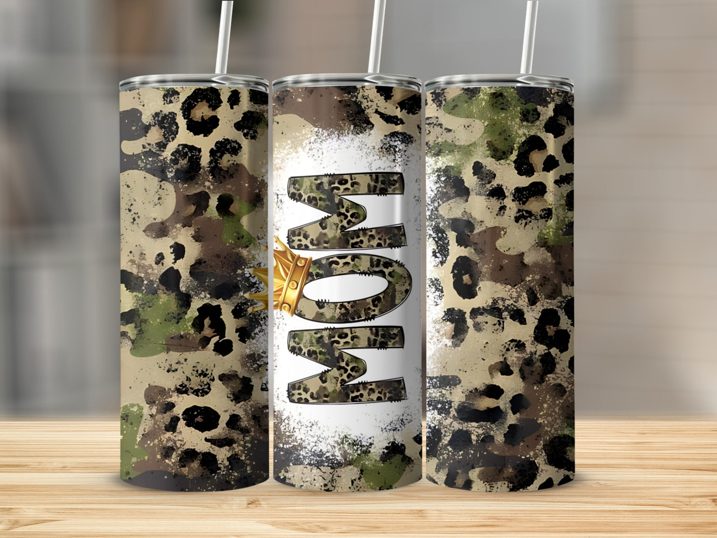 Camouflage and leopard print tumbler with "MOM" and a crown.