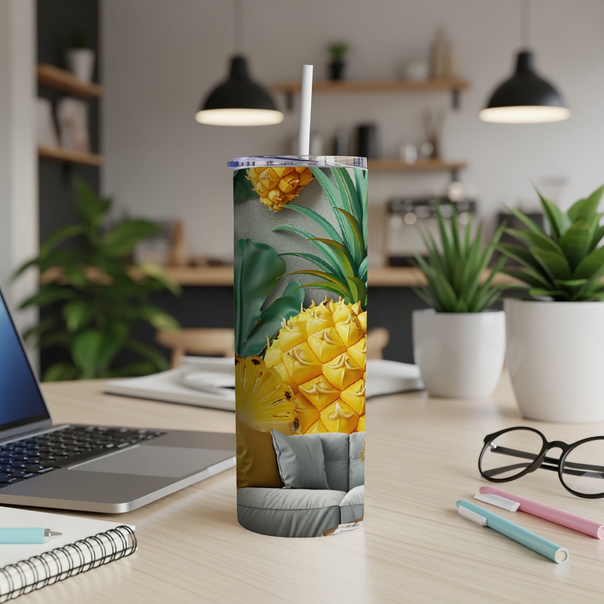 Tumbler with a close-up pineapple design featuring green leaves and textured background.