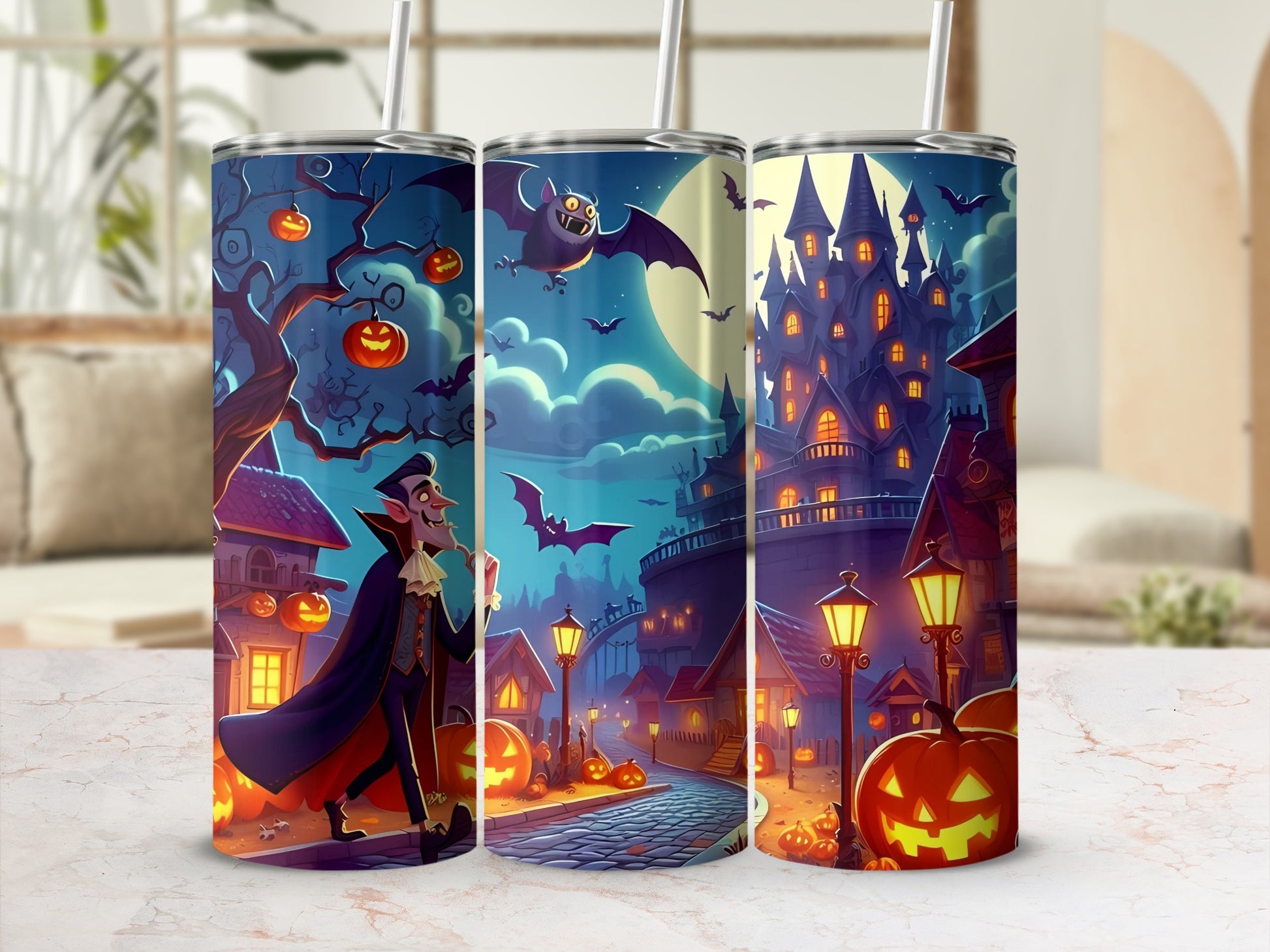 Three tumblers with a Halloween theme featuring a vampire, castle, and bats.