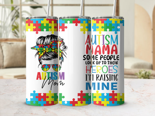 Autism Mama design on a colorful puzzle piece tumbler.
