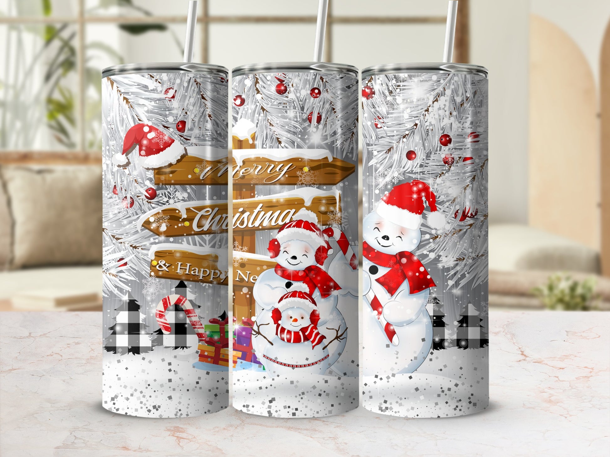 Three tumblers with a Christmas snowman design and "Merry Christmas" text.