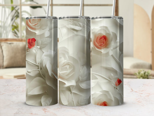 Three tumblers with cream roses and red accents on a marble surface.