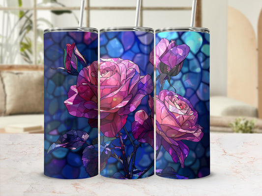 Three tumblers with a stained-glass rose design on a marble countertop.
