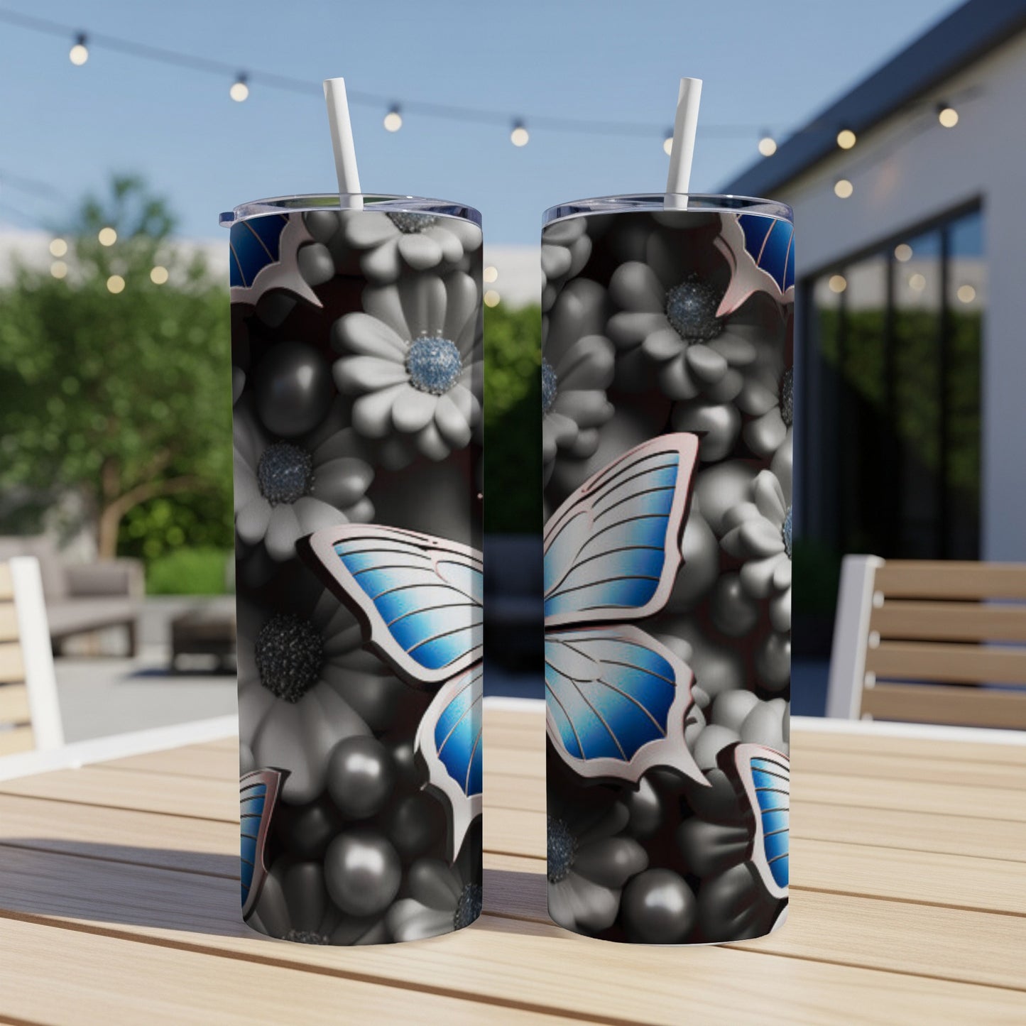Two stainless steel tumblers with a butterfly and floral pattern.