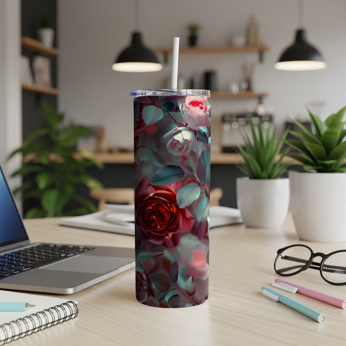 Tumbler with realistic red and pink roses against a dark background.